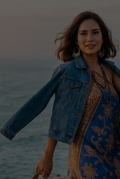 Talent posing on a beach at sunset